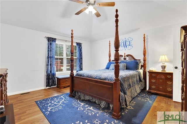 bedroom featuring hardwood / wood-style flooring and ceiling fan