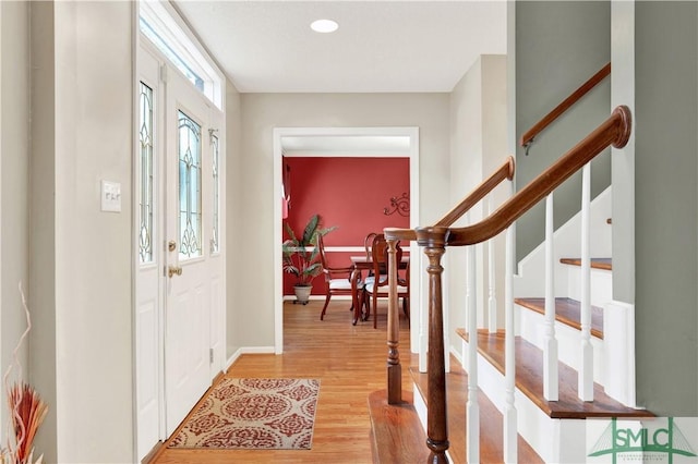 entrance foyer with light hardwood / wood-style floors