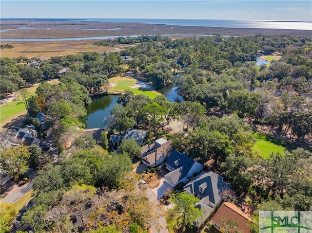 bird's eye view with a water view