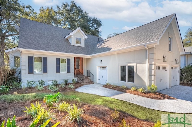 view of front of home with a garage