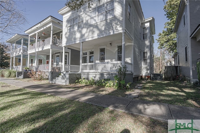 exterior space with a yard and covered porch