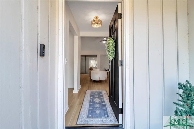 corridor featuring hardwood / wood-style flooring