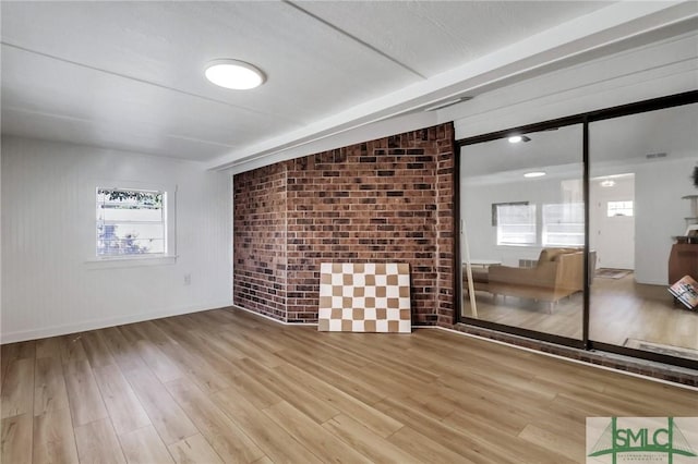 unfurnished room featuring light hardwood / wood-style floors