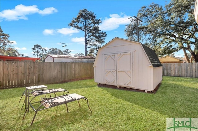 view of outbuilding with a lawn