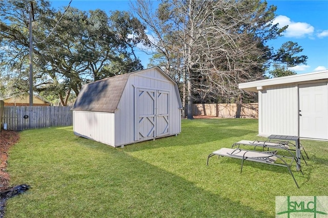 view of outdoor structure featuring a lawn