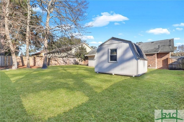 view of yard featuring a storage unit