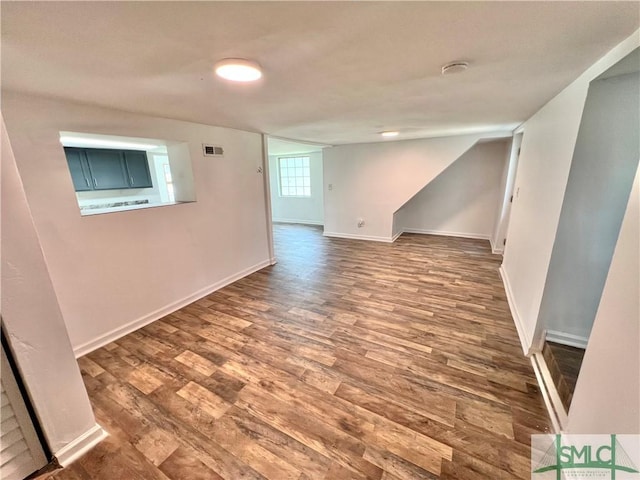 unfurnished room featuring hardwood / wood-style floors