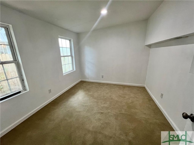 empty room featuring carpet floors