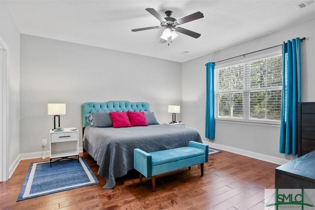 bedroom featuring ceiling fan and wood-type flooring