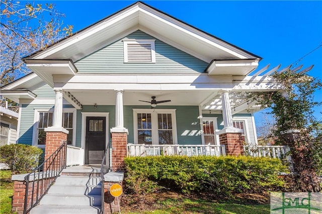 view of front of house with a porch and ceiling fan