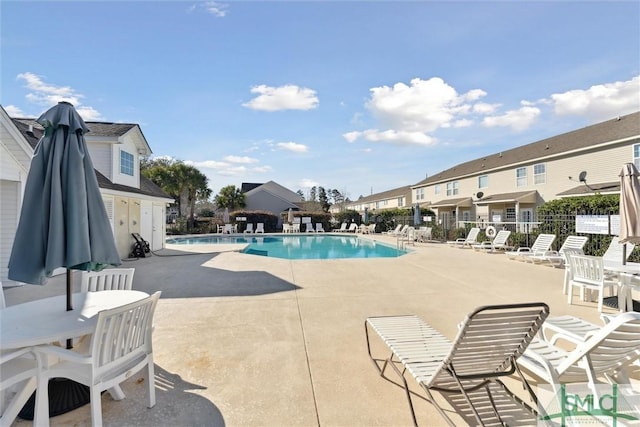 view of swimming pool featuring a patio area