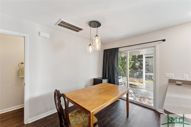 dining room featuring dark hardwood / wood-style floors