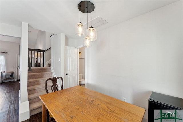 dining room featuring dark hardwood / wood-style floors