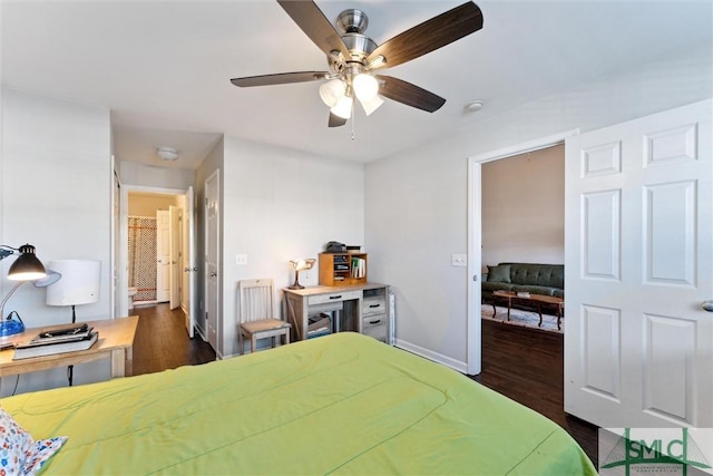 bedroom featuring ceiling fan and dark hardwood / wood-style flooring