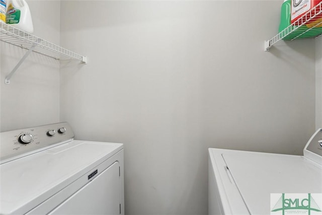 laundry area featuring independent washer and dryer