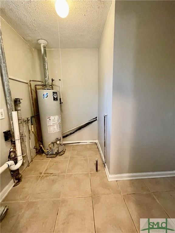 utility room with water heater