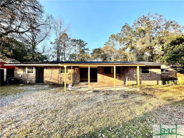 view of front of house with a patio