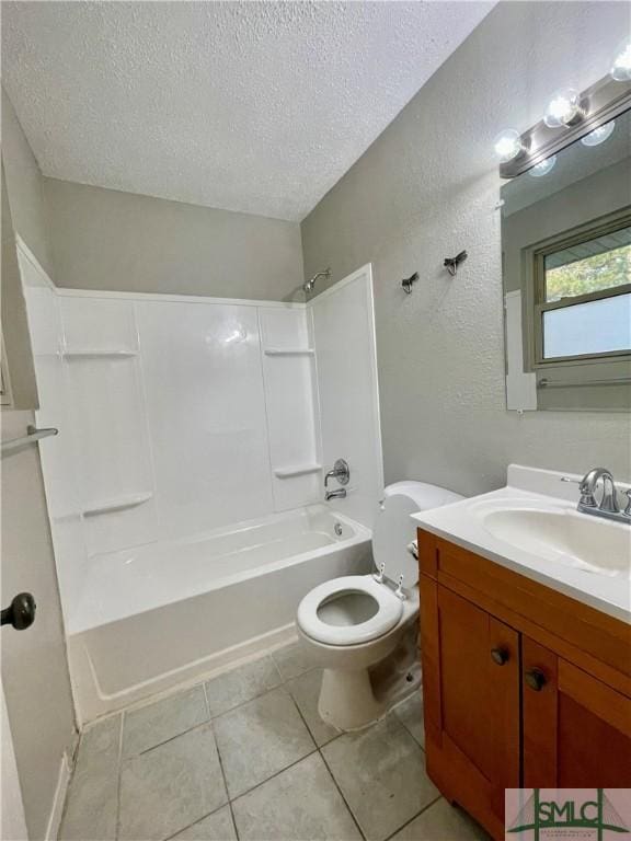 full bathroom with vanity,  shower combination, tile patterned flooring, toilet, and a textured ceiling