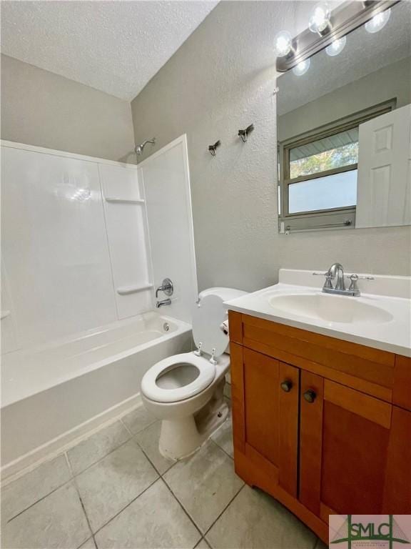 full bathroom with vanity, washtub / shower combination, tile patterned flooring, toilet, and a textured ceiling