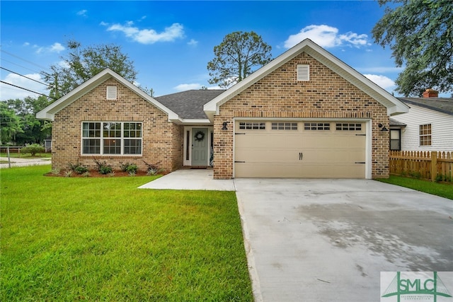 front of property featuring a garage and a front lawn