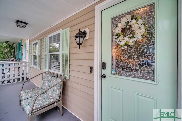 entrance to property with covered porch