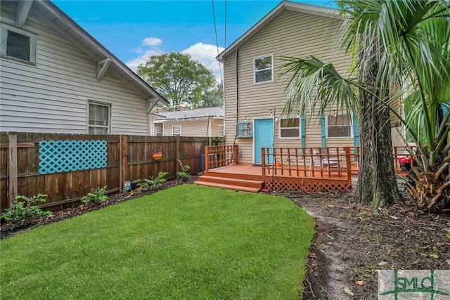 view of yard with a wooden deck