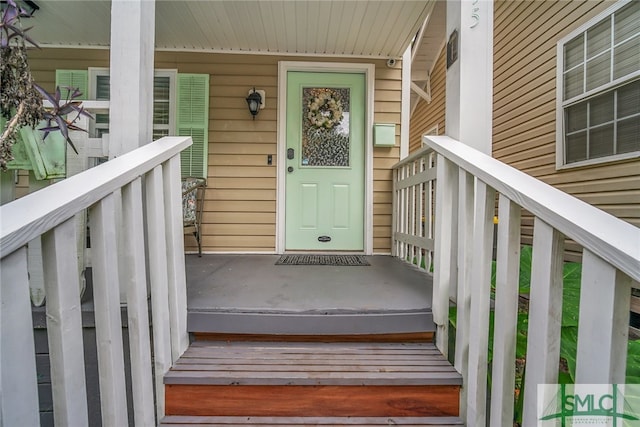 doorway to property featuring a porch