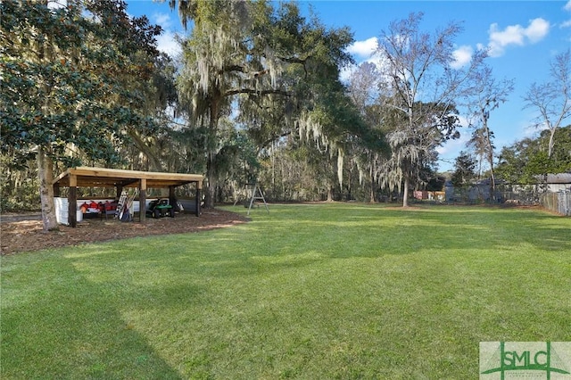 view of yard with a carport