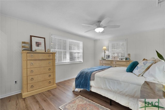 bedroom featuring ceiling fan and light wood-type flooring