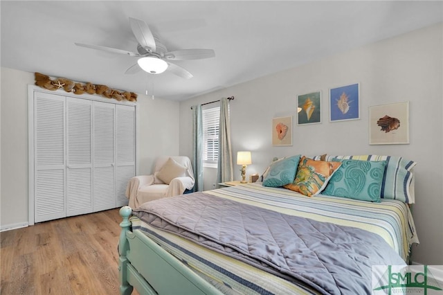 bedroom featuring a closet, light hardwood / wood-style flooring, and ceiling fan