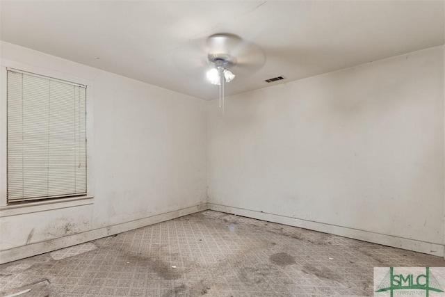 empty room featuring ceiling fan