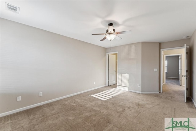 unfurnished bedroom featuring light colored carpet and ceiling fan