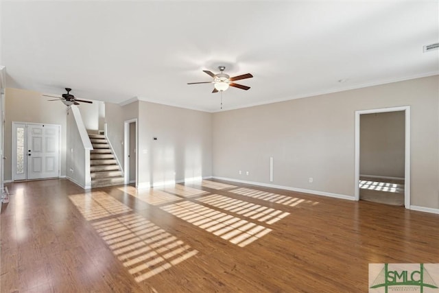 unfurnished living room featuring ceiling fan, dark hardwood / wood-style flooring, and ornamental molding