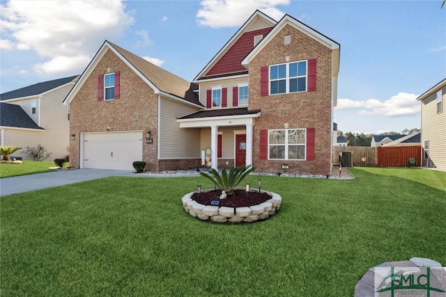 view of front of home featuring a front yard, a garage, and central air condition unit