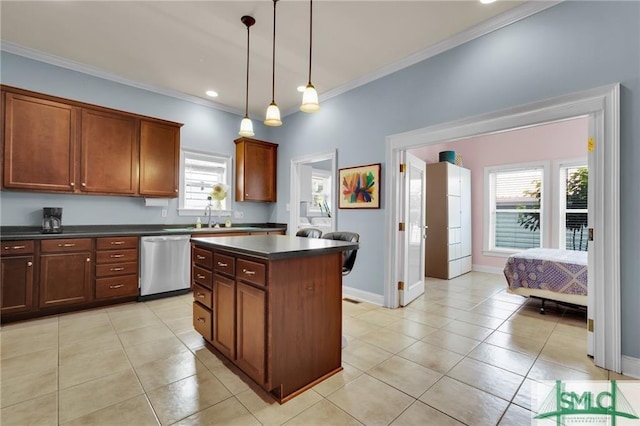 kitchen featuring stainless steel dishwasher, ornamental molding, sink, a kitchen island, and light tile patterned flooring