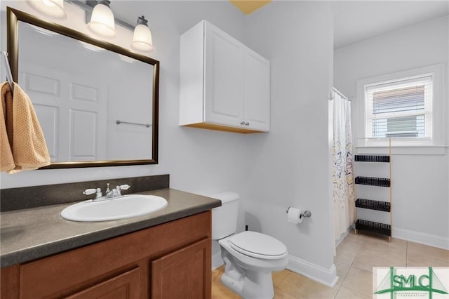 bathroom featuring tile patterned flooring, vanity, toilet, and radiator