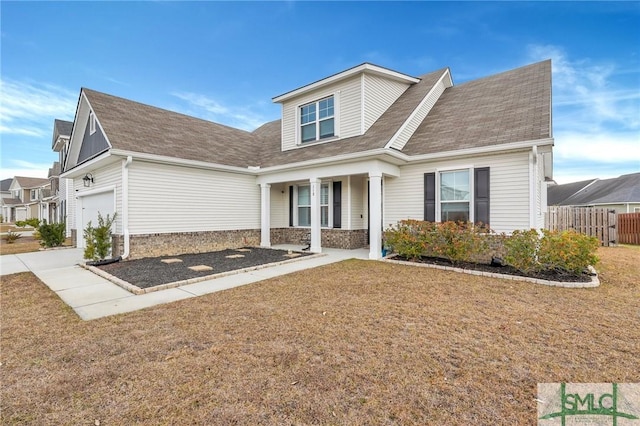 view of front of home featuring a front lawn