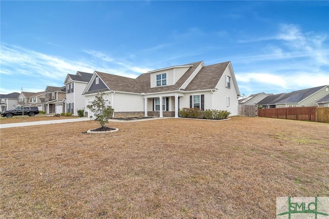 view of front of home featuring a front yard