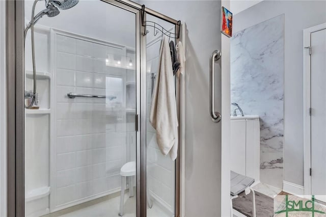 bathroom featuring a shower with door