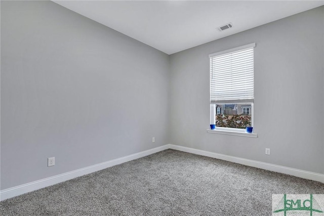 empty room featuring carpet flooring