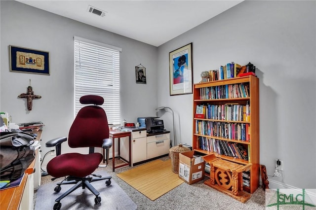 view of carpeted office space