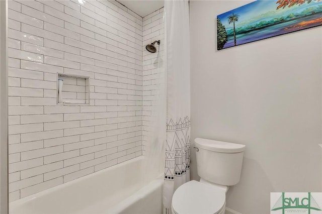 bathroom featuring shower / bathtub combination with curtain and toilet