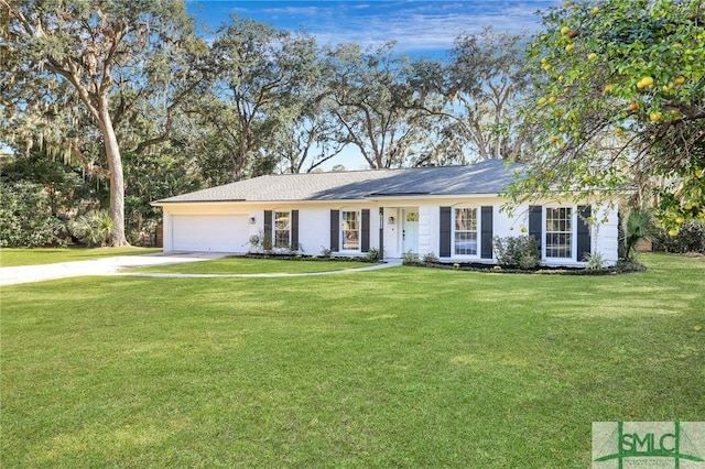 ranch-style home featuring a front yard and a garage