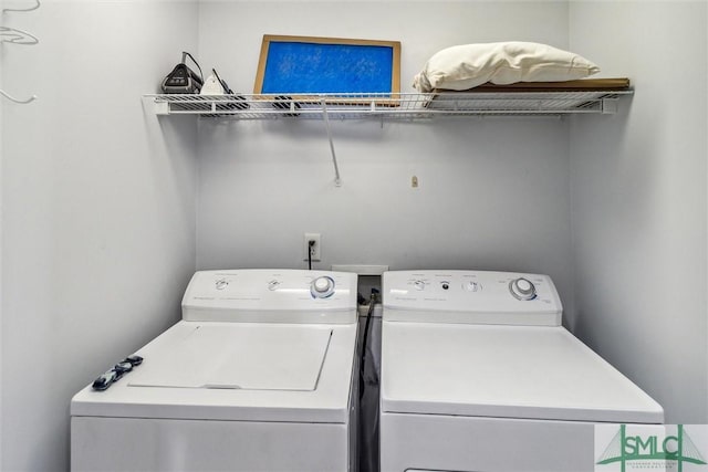 washroom with separate washer and dryer