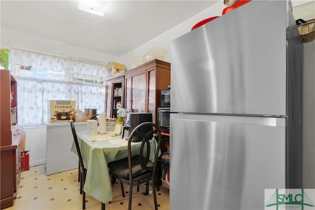 kitchen featuring stainless steel fridge