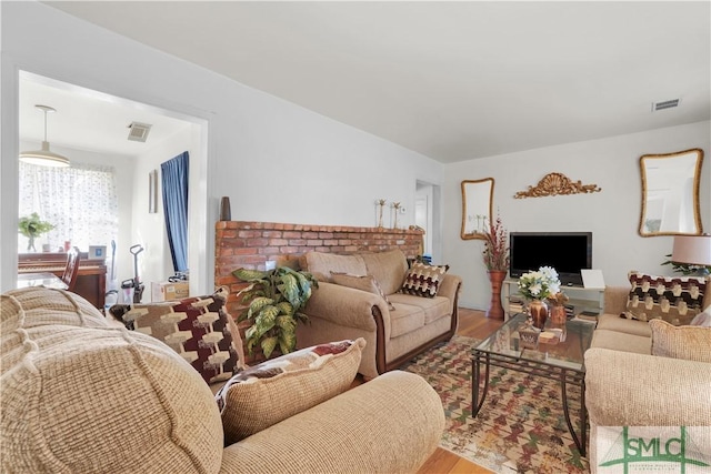 living room with hardwood / wood-style flooring