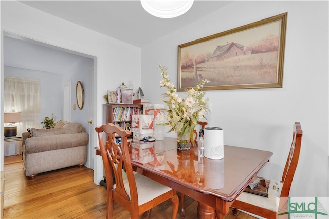 dining area featuring hardwood / wood-style floors