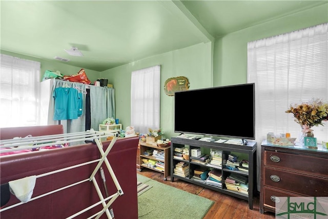 bedroom featuring dark hardwood / wood-style flooring