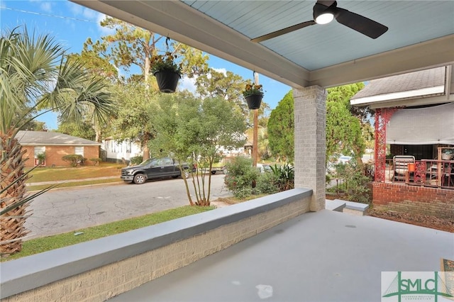 view of patio / terrace featuring ceiling fan