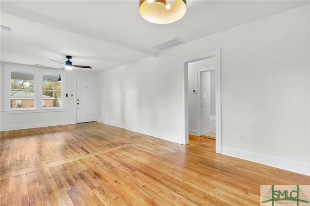 interior space with ceiling fan and light hardwood / wood-style flooring